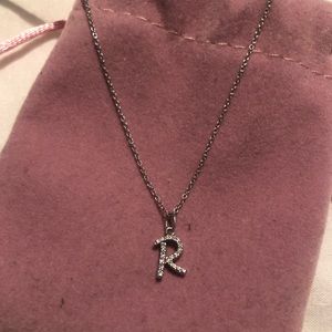 Dainty initial “R” necklace. From Ben Bridges.